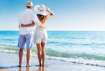 Couple at the coast feeling secure, income protected
